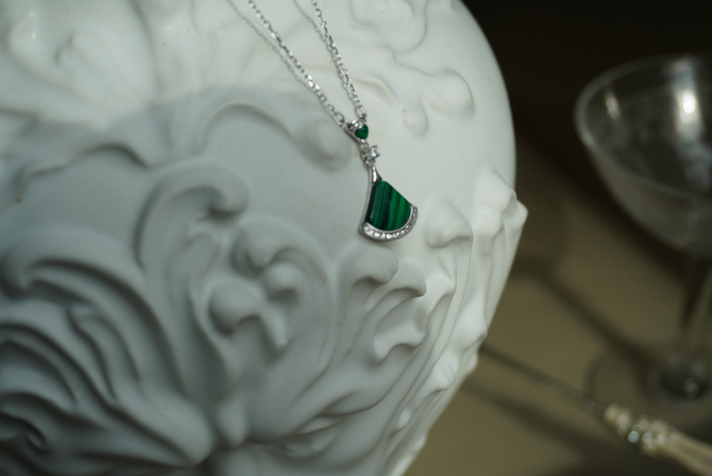 Refined silver chain with malachite and zircons